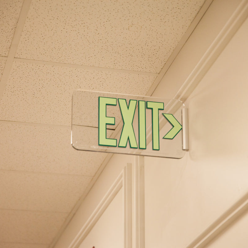 Clear Lucite Emergency Exit Sign, LED compliant exit sign, Alternative exit signs, energy free exit signs, Photoluminescent Exit Signs, Electric Sign Alternative, UL924 Emergency Exit Sign, Electric Exit Signs